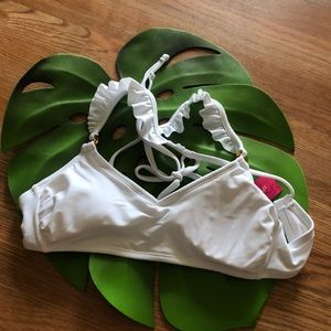 White Swim top with ruffle